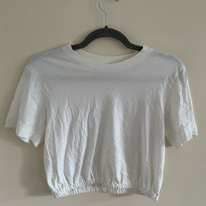 Aritzia white cropped top.